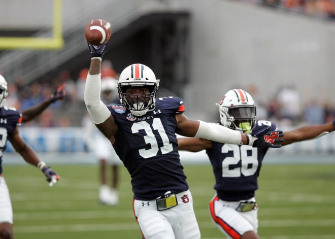 Chandler Wooten celebrates an interception.