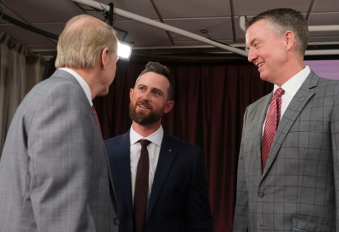 The University of Alabama introduced Rob Vaughn as the new head baseball coach Tuesday, June 13, 2023. Alabama President Stuart Bell and Athletic Director Greg Byrne talk with Vaughn immediately after the press conference. Photo | Gary Cosby Jr.-Tuscaloosa News / USA TODAY NETWORK