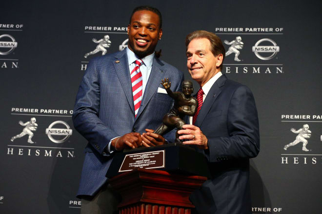 Former Alabama running back Derrick Henry (left) won the Heisman award in 2015. Photo | USA Today