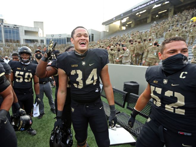 Army's 'D' step up with big plays from players like Carter & West, who celebrate the Black Knights' win