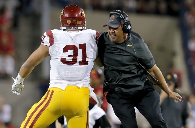 Longtime USC assistant and current UCLA defensive line coach Johnny Nansen will take over as Arizona's next defensive coordinator.