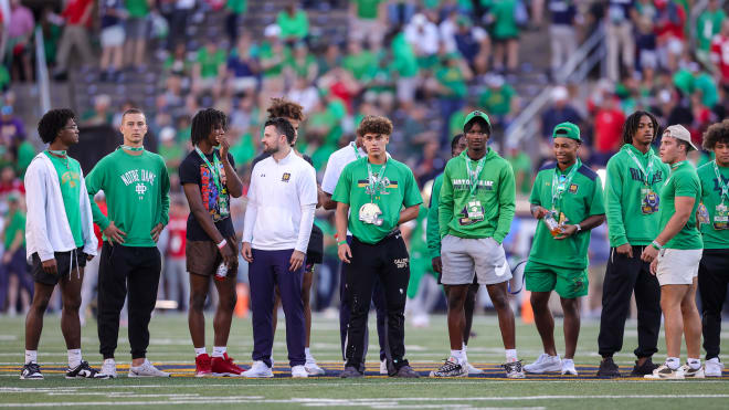Notre Dame football plans to welcome 18 commits on Saturday for its game against USC. Director of recruiting Chad Bowden leads the commits and other visiting recruits onto the field before each game.