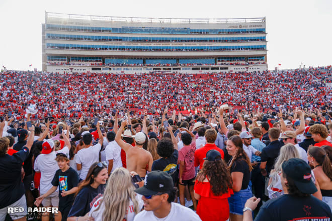Texas Tech fans storm the field after the win