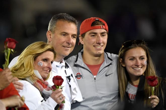 Then-Ohio State coach Urban Meyer with wife Shelley Meyer, son Nathan Meyer and daughter Gisela Meyer celebrate after the team won the Rose Bowl on Jan. 1, 2019. 