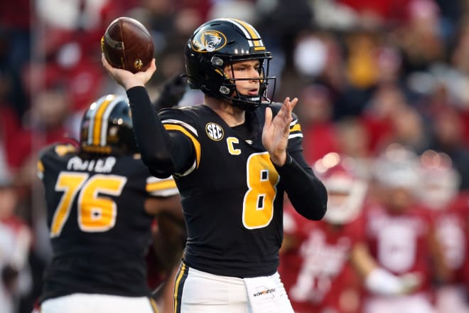 Nov 26, 2021; Fayetteville, Arkansas, USA; Missouri Tigers quarterback Connor Bazelak (8) throws a pass during the second half against the Arkansas Razorbacks at Donald W. Reynolds Razorbacks Stadium. (Nelson Chenault-USA TODAY Sports)