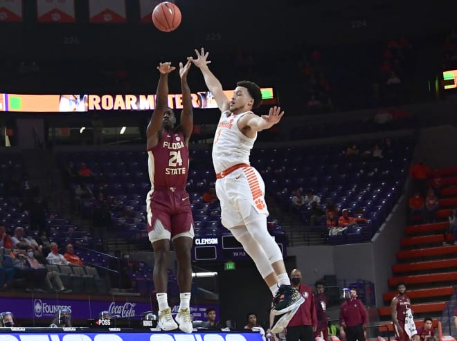 Sardaar Calhoun rises up for a 3-point attempt on Tuesday night at Clemson. 
