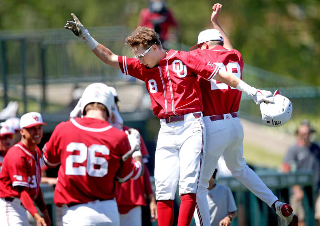 Oklahoma outfielder John Spikerman celebrates a run