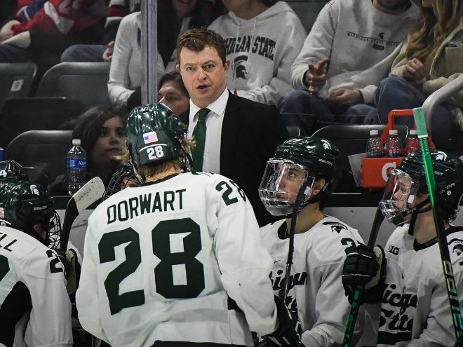 Michigan State head coach Adam Nightingale talks to his team