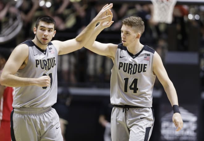 Ryan Cline's spark in the second half helped Purdue beat No. 13 Wisconsin. Dakota Mathias (left) assisted on all of Cline's buckets.