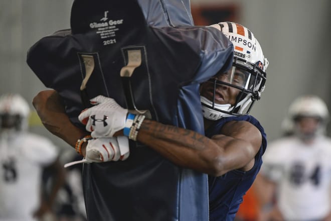 Simpson works in a drill during spring practice.