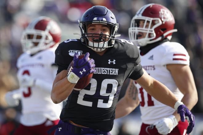 Evan Hull ran for 220 yards and four touchdowns for Northwestern.