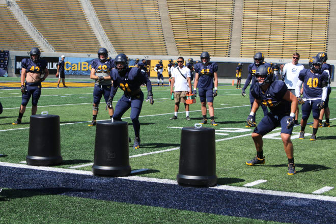 Gerran Brown (right) came over to Cal with the help of FB Malik McMorris