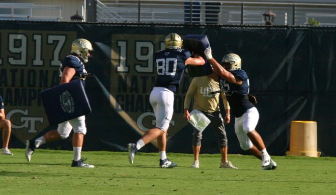 Billy Ward and Dylan Leonard during TE blocking drills