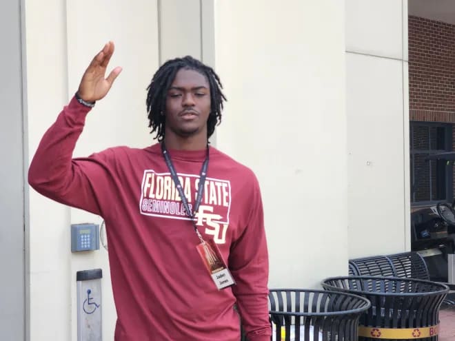 Jaden Jones throws up a chop during his visit to FSU in May.