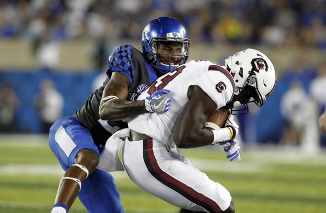 Kentucky's Derrick Baity brought down a South Carolina receiver in the Wildcats' 17-10 win over the Gamecocks last season at Commonwealth Stadium..