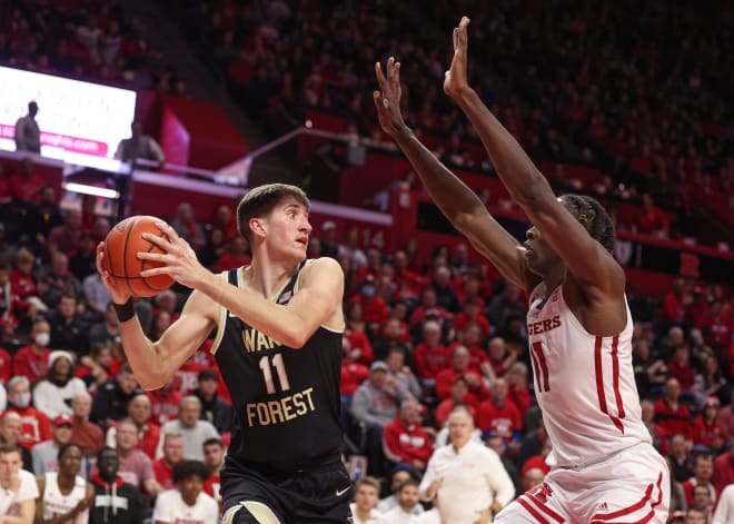 Wake Forest's Andrew Carr looks to get around Rutgers' Clifford Omoruyi during last year's game. 