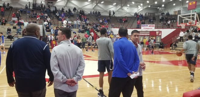 Indiana head coach Archie Miller and associate head coach Tom Ostrom visit with high school coaches in between games at Southport on December 14. 