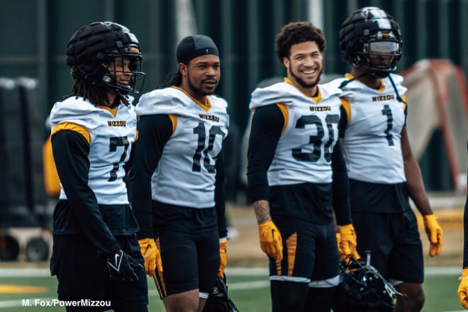 Kris Abrams-Draine (No. 7) stands alongside linebackers Dameon Wilson (No. 10), Chuck Hicks (No. 30) and safety Jaylon Carlies (No. 1).