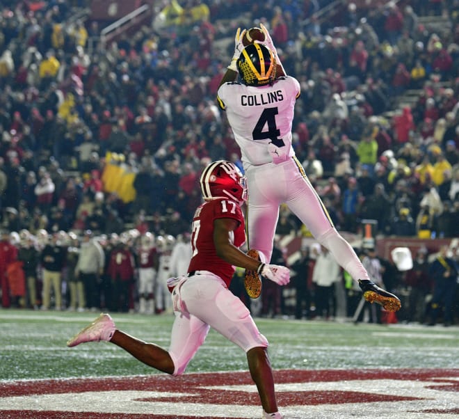 Michigan wide receiver Nico Collins catches another touchdown pass with Indiana cornerback Raheem Layne in coverage in Michigan's 39-14 defeat of Indiana. (USA Today Images)