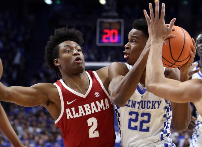 Kentucky's Shai Gilgeous-Alexander attempted to drive past Alabama guard Collin Sexton during Saturday's game at Rupp Arena.