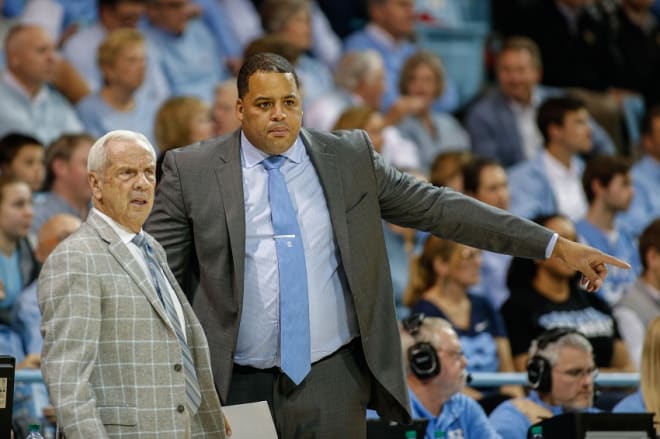 Sean ay (right) spent the last six seasons working for Roy Williams. 