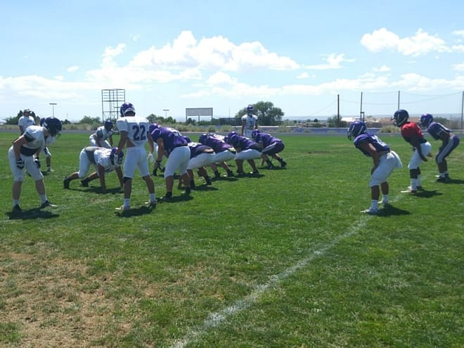 The Manzano offense ready to run a play during Monday afternoon's practice.