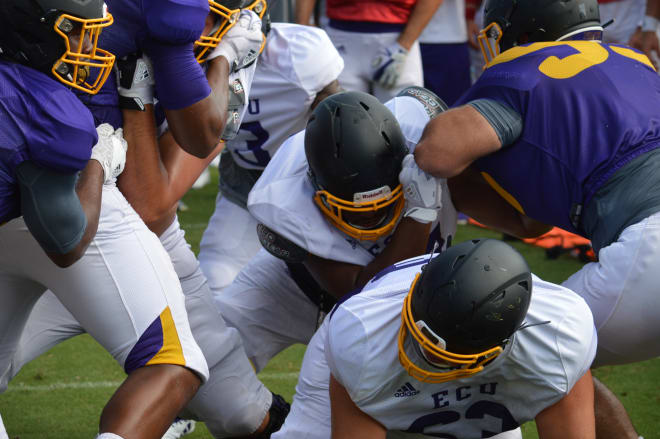 ECU put in a spirited two-hour workout on Tuesday as fall camp continues for the Pirates at Hight Field.