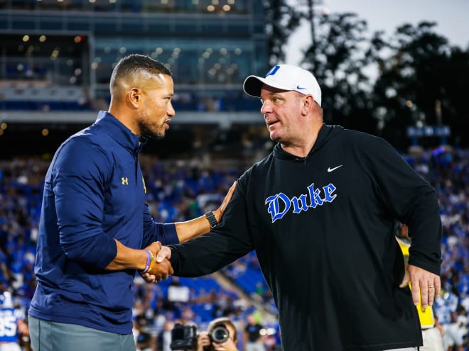 Notre Dame head coach Marcus Freeman (left) will open the 2024 season playing against former Duke head coach Mike Elko in his new job at Texas A&M.