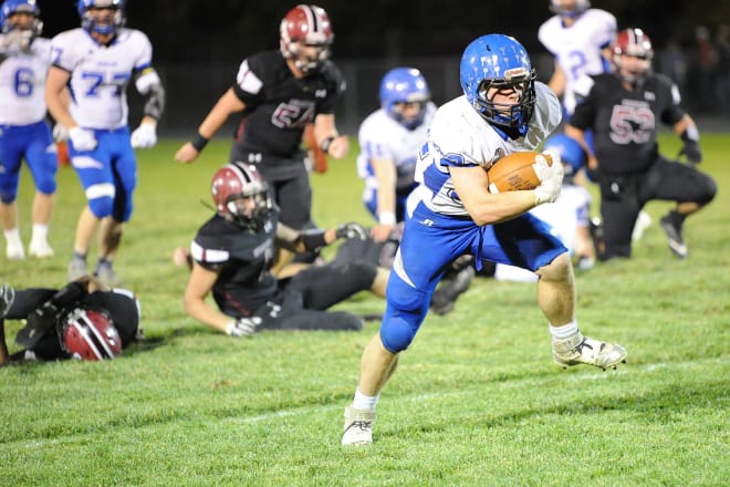 Leaving carnage in his wake, Kenesaw senior Daniel Duffy (32) takes off for the end zone, part of his team's 72-40 win Friday night at Heartland.