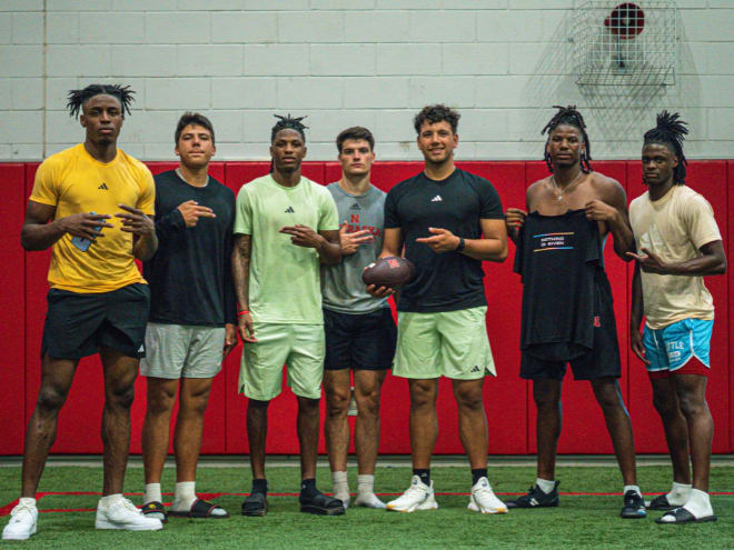 Nebraska football players, from left to right, Isaiah Neyor, Dayton Raiola, Jacory Barney Jr., Alex Bullock, Dylan Raiola, Jahmal Banks and Jaylen Lloyd after a throwing session in Texas during early June