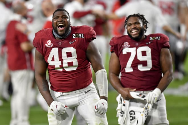 Alabama Crimson Tide defensive lineman Phidarian Mathis (48) and offensive lineman Chris Owens (79) should both be team leaders this year. Photo | Getty Images
