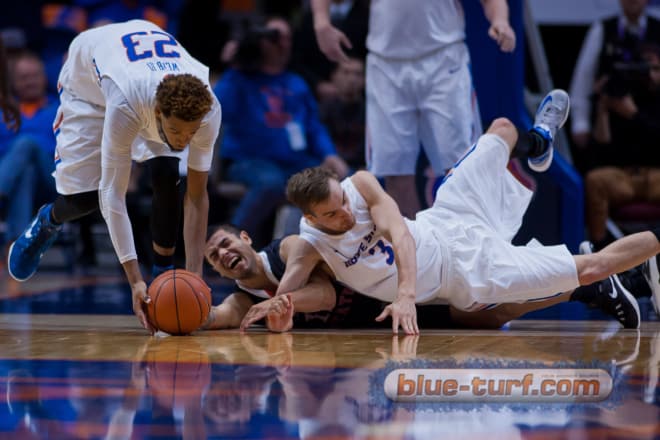 Boise State's James Webb III scoops up a loose ball and takes it the length of the court for two points.