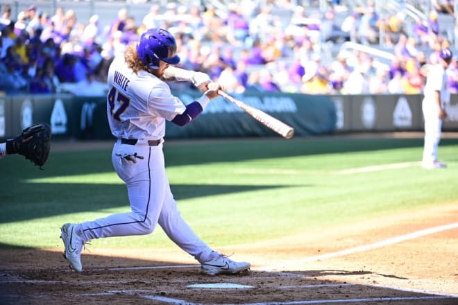 LSU designated hitter Tommy White hit his first two homers of the season and drove in five runs in the Tigers' runaway win over Central Connecticut State Saturday afternoon in Alex Box Stadium. 