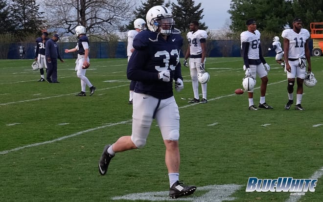 Cooper ran off the field following a Nittany Lion practice in April. 