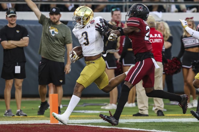 Logan Diggs scores one of this two TDs for Notre Dame Friday in a 45-38 Irish Gator Bowl win over South Carolina.