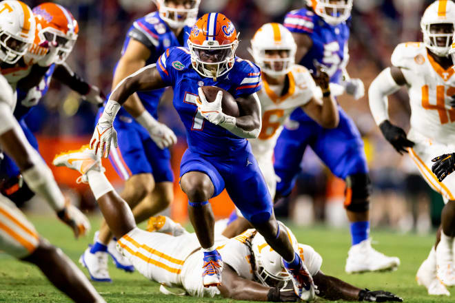 Sep 16, 2023; Gainesville, Florida, USA; Florida Gators running back Trevor Etienne (7) rushes with the ball during the first half against the Tennessee Volunteers at Ben Hill Griffin Stadium.