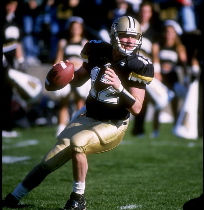 Billy Dicken was first-team All-Big Ten as a fifth-year senior in 1997, showing a knack for running the spread attack of new coach Joe Tiller.