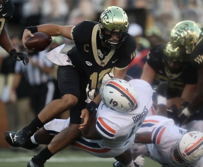 Sam Hartman and the Deacs got going early and late to beat UVa on Saturday.