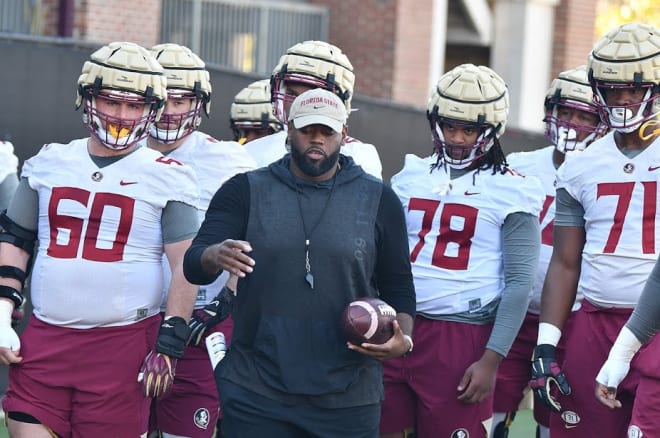 Meeting of the Offensive Line Masterminds