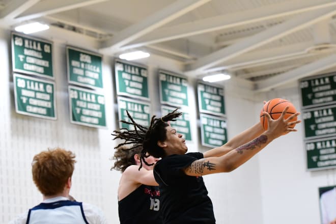 Tyronn Ferrell, here rebounding, is a player to track this spring/summer.  