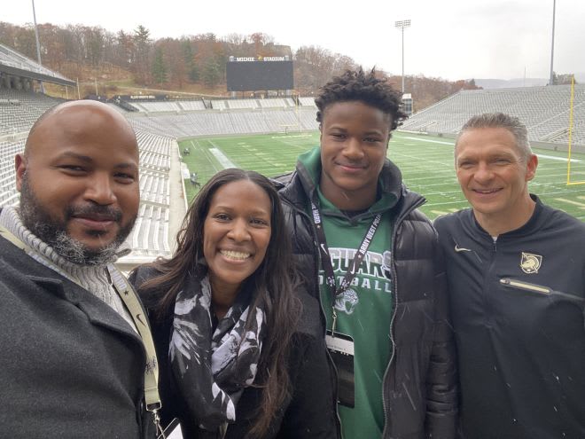 Maurice Brown is joined by his dad and mom, along with Army Head Coach Jeff Monken during his unofficial visit to West Point