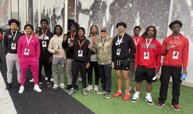 Texas Tech HC Joey McGuire with a group of recruits this weekend
