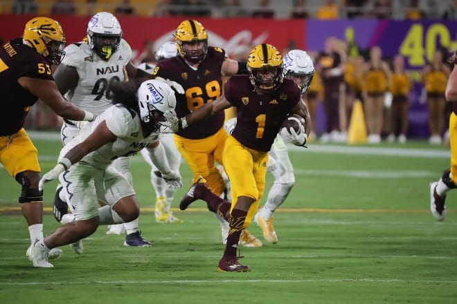 Wyoming transfer RB Xazavian Valladay posted 116 yards on 15 attempts, scoring two of ASU’s four touchdowns 
