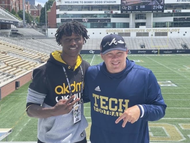 Gaskins poses with Tech head coach Geoff Collins during his visit