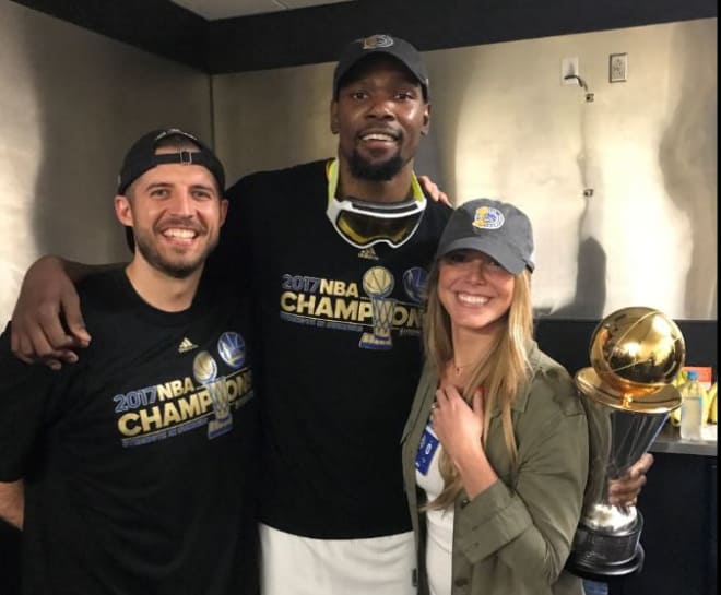 Former FSU point guard Luke Loucks, who worked on the Golden State Warriors staff this year, celebrates with his wife, Stevi, and Finals MVP Kevin Durant.