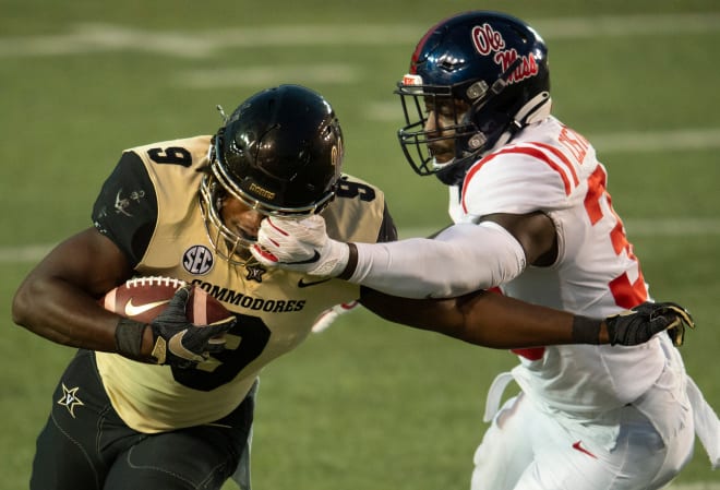 Vanderbilt running back Rocko Griffin (9) is stopped as Mississippi linebacker Cedric Johnson (33) during the fourth quarter at Vanderbilt Stadium Saturday, Oct. 31, 2020 in Nashville, Tenn.