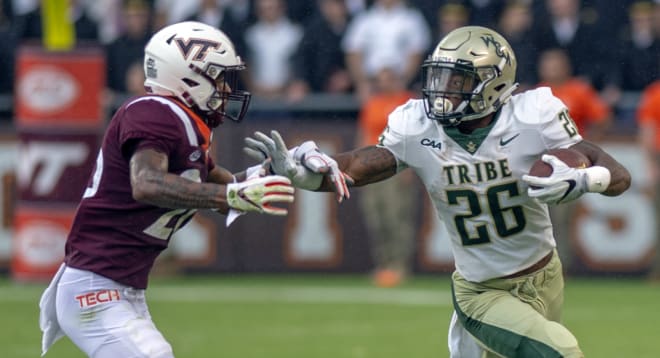 William & Mary running back Albert Funderburke (26) carries the ball during the Tribe's loss to Virginia Tech last year in Blacksburg.