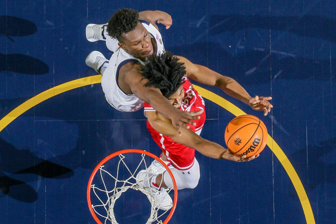 Notre Dame's Ven-Allen Lubin defends in the paint against Boston U.'s Miles Brewster.