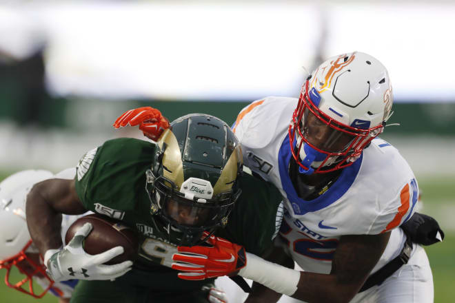 Boise State cornerback Tyric LeBeauf, right, tackles Colorado State wide receiver Warren Jackson after he caught a pass in the second half of an NCAA college football game Friday, Nov. 29, 2019, in Fort Collins, Colo. Boise State won 31-24.