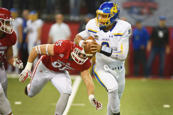 South Dakota State junior quarterback Taryn Christion escapes the pocket during a game at South Dakota earlier this season.
